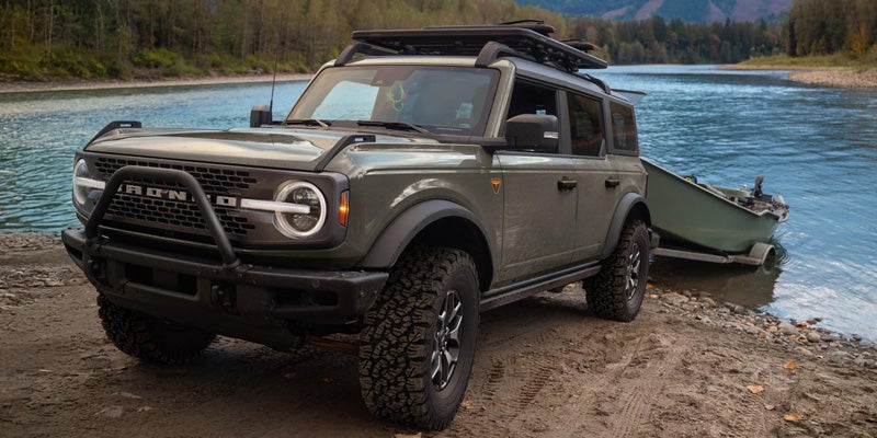 A 2026 Ford Bronco hauling a fishing boat out of the water.